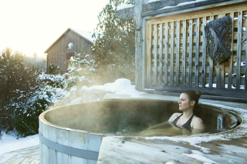 Woman inside a outdoor sauna