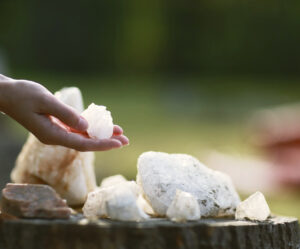 Crystals arranged on a wooden stump