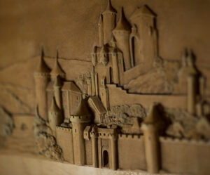 Stone carving of a castle