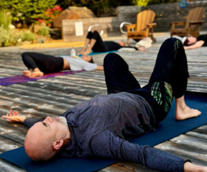 Group practicing yoga together