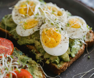 close of avocado toast with egg