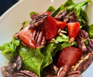 Close up of strawberry and pecan salad