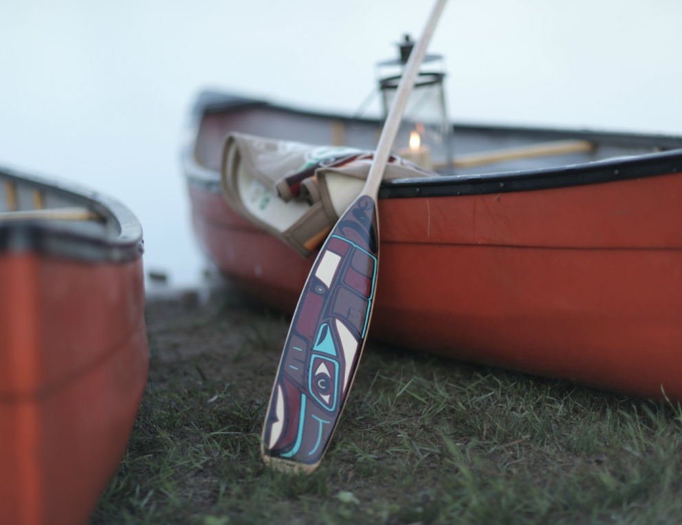 Canoe on the side of a lake