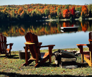 Fire pit in front of a lake