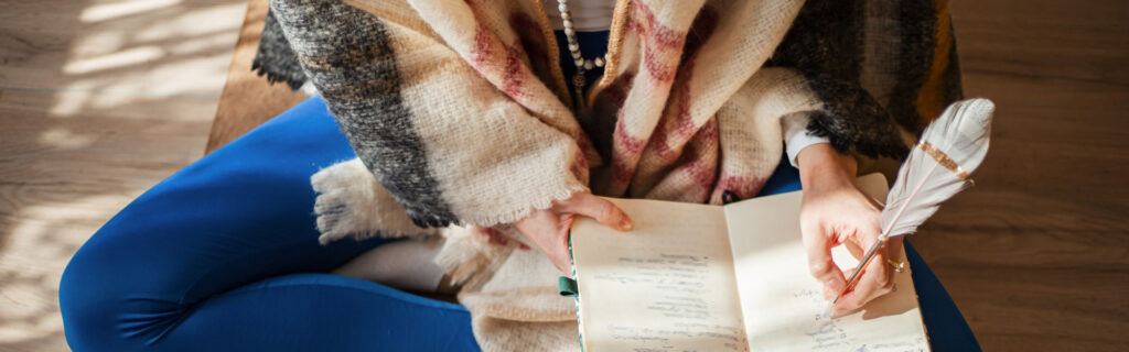 Woman writing in a notebook