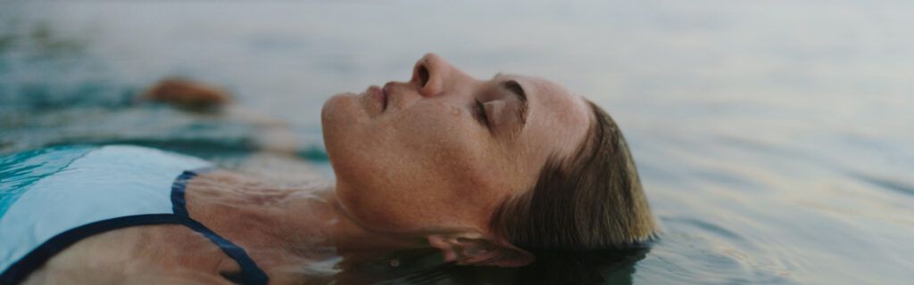 Woman floating in water