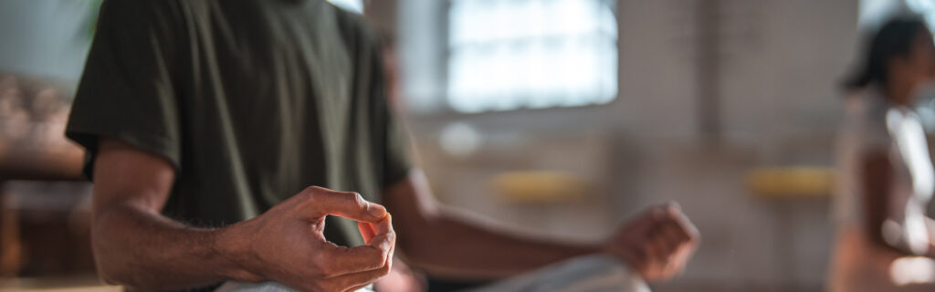 People practicing meditation together