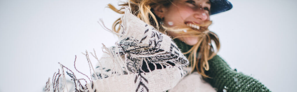 Woman bundled up in a scarf