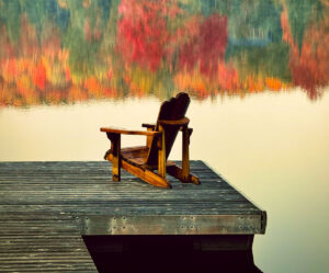 Single chair on the end of a dock