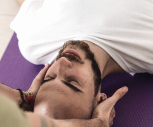 Man receiving a neck message